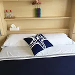 Quarto em Acomodações Particulares Kelly Lausana