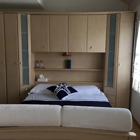Quarto em Acomodações Particulares Kelly Lausana